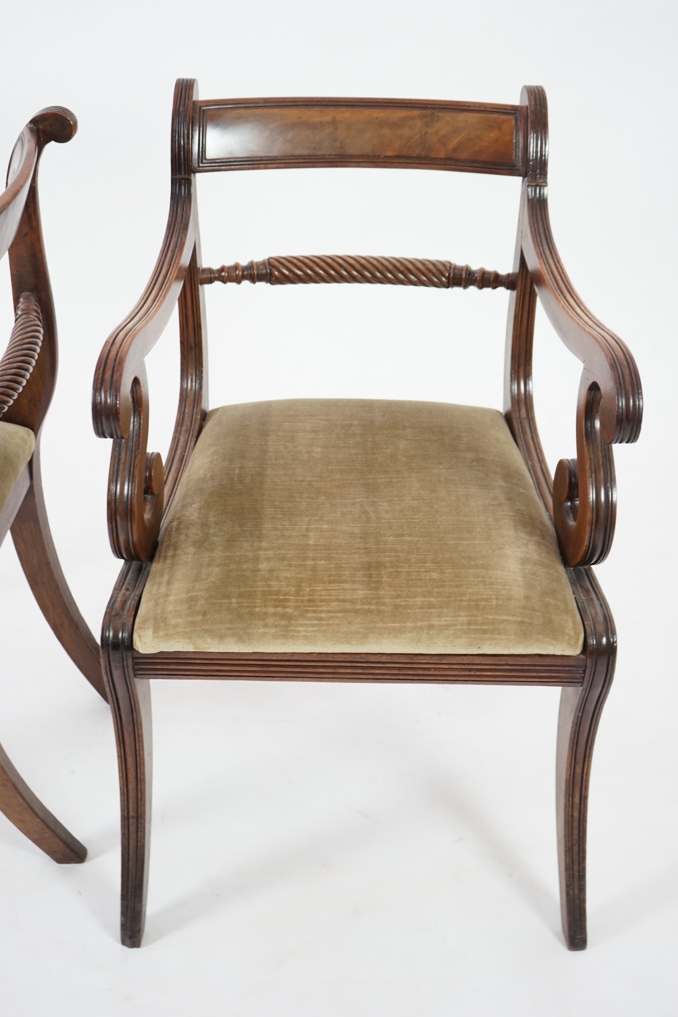 A set of ten Regency mahogany dining chairs, including a pair of carvers